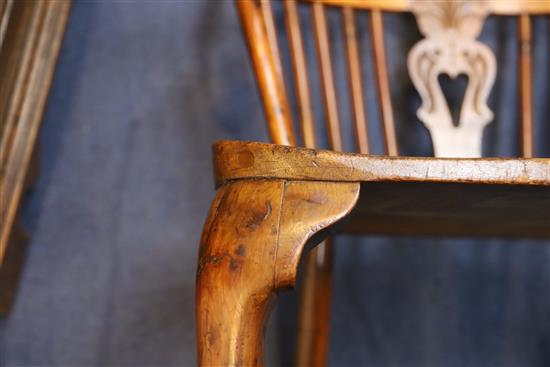 An early 19th century yew, ash and elm Windsor chair, W.2ft D.1ft 9in. H.3ft 5in.